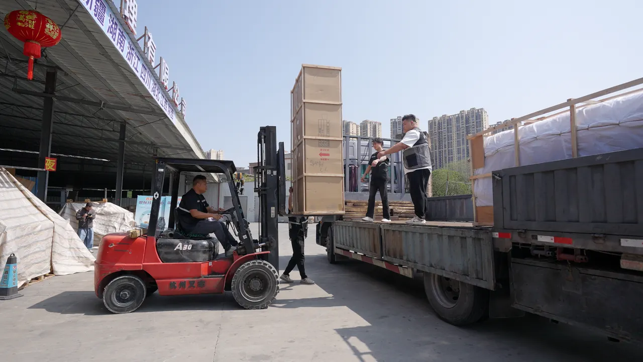 Forklift loading materials at a logistics site